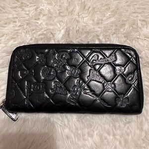 CHANEL Black Quilted Embossed Wallet